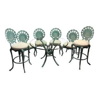 Hollywood Regency Veneman Cast Aluminum Clamshell Patio Set With Tags, Four Chairs, Bar Stools, and Glass Pedestal Table, 7 Pieces For Sale