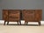 A pair of mid century modern walnut nightstands with burl doors made by Young Manufacturing. Professionally refinished....