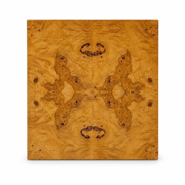 This is a large scale modern bookmatched burl wood cube form side table or pedestal in the attributed to Milo Baughman. It...