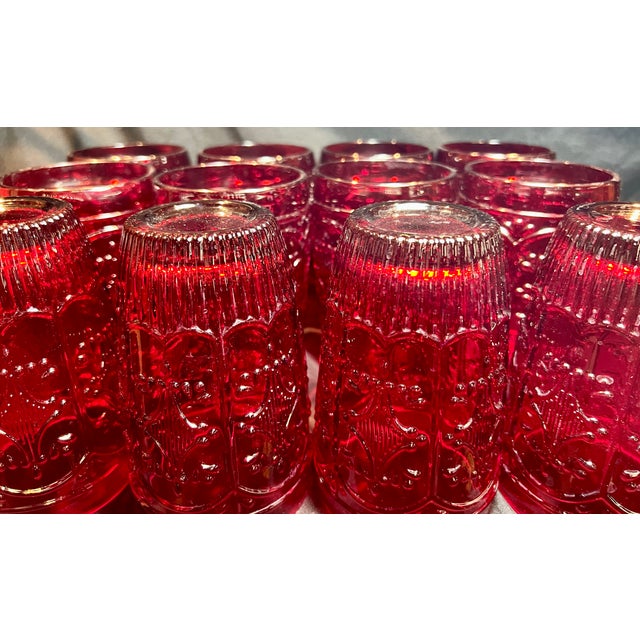 Set of 12 Fitz and Floyd Glass glasses, Trestle design. Color is red. Rarely used. In great shape. No scratches or chips