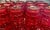 Set of 12 Fitz and Floyd Glass glasses, Trestle design. Color is red. Rarely used. In great shape. No scratches or chips