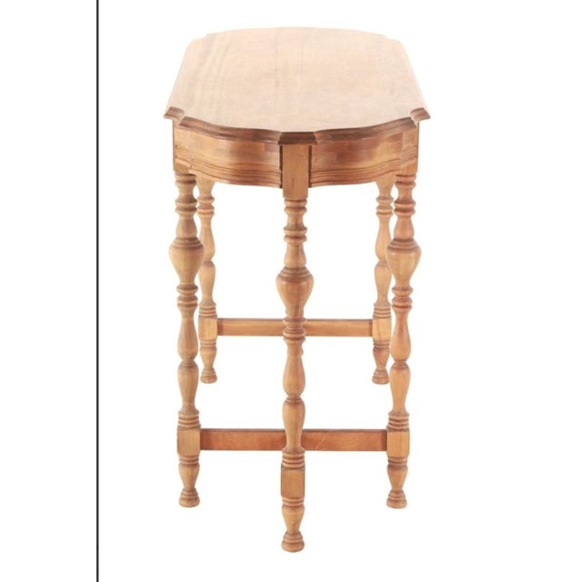 Signature turned legs and hexagonal top we are drawn to at Maison Montane. This piece shows durability and has been...