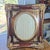 This vintage ornate gold gilt picture frame in a Victorian revival style features an oval opening measuring 8x10 inches,...