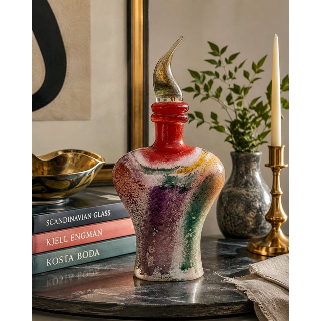 A striking example of late 20th-century Scandinavian art glass, this sculptural decanter was designed by celebrated...