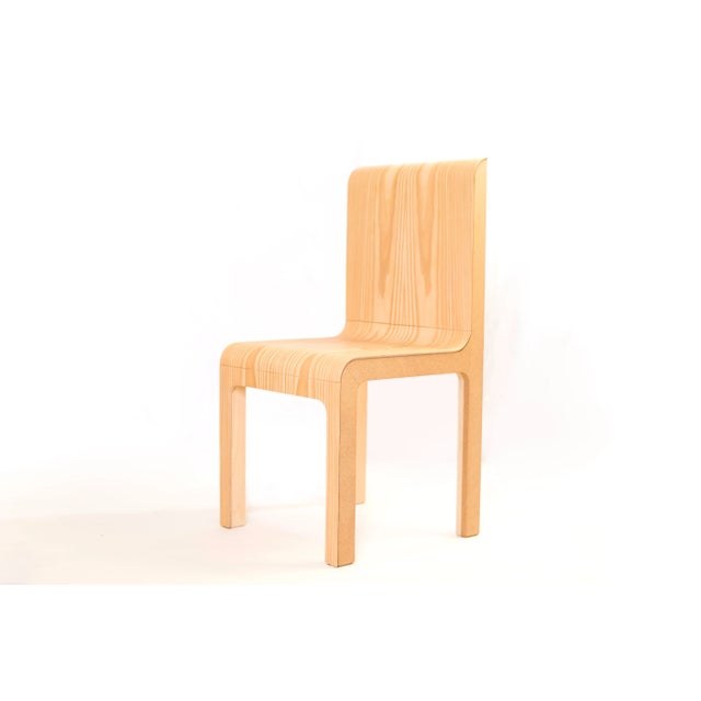 This C1 Chair is made of parasol pine and brown cork.