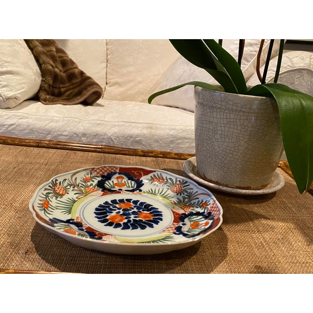 Vintage Mid Century Handpainted Decorative plate; lovely detail and painted in tones of blue, red, green and orange. part...