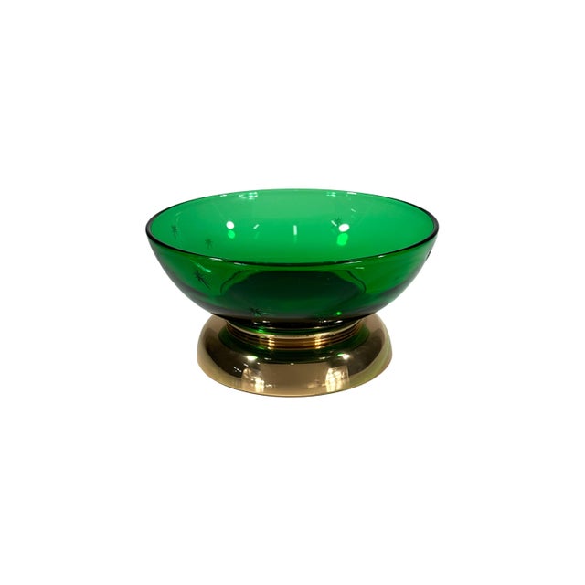 Beautiful MCM green glass bowl with starburst details and gold toned metal base. Dimensions: Overall- 4 3/4" H x 9 3/8" W...