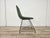 Aster chair by Augusto Bozzi for Saporiti Italia, entirely upholstered in forest green fabric with an iron frame and brass...