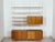For sale is a very beautiful and well-preserved "Sybille 314" shelving system with elegant cherry wood veneer. The...
