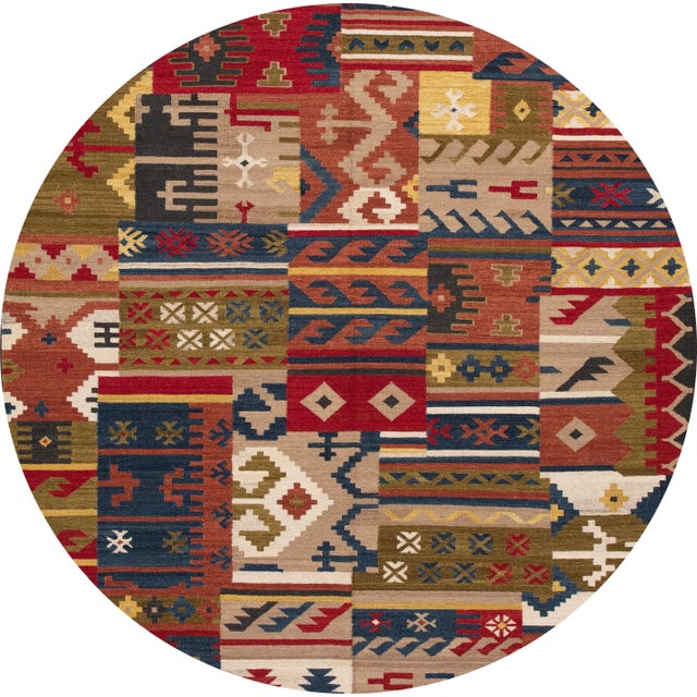 A beautiful hand-woven modern Kilim rug with a tan field and multi-color accents in an all-over geometric design. This rug...