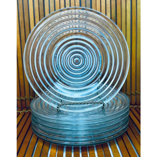 Add a touch of vintage elegance to your table setting with this stunning set of 7 bread and butter plates from the Park...