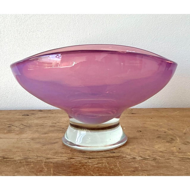 This striking vintage Italian art glass bowl is a masterful expression of mid-century Murano-style craftsmanship....