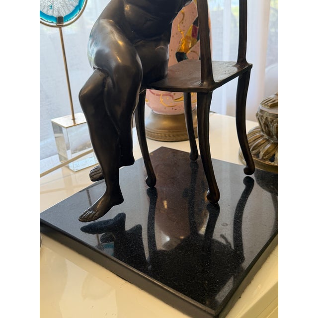 Artist Executed Bronze Female Sculpture Resting on Chair Stone Base For Sale In Miami - Image 6 of 6