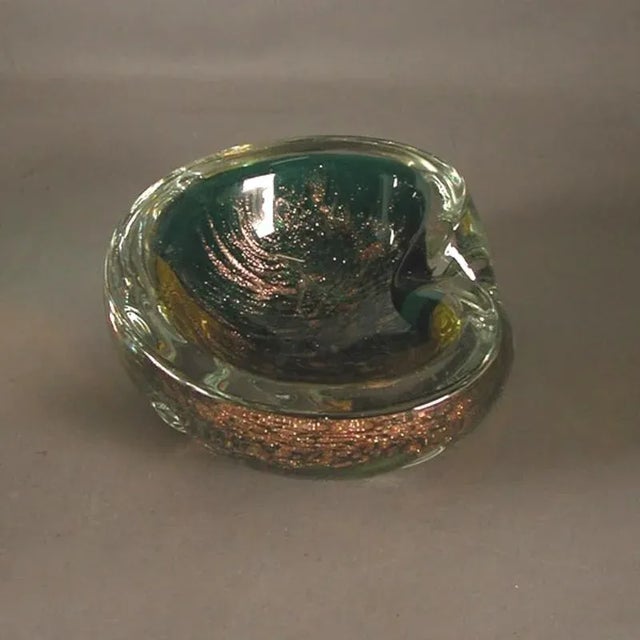 This round Murano ashtray was designed by Fratelli Toso.