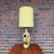 A beautiful green and brown ceramic lamp in mid-century Danish fashion. With its asymmetrical curves, unique carved holes,...