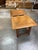 An exceptional and highly architectural matching pair of vintage mid-century modern square side tables or end tables....