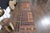 Vintage Hand-Knotted runner rug is a semi-antique vintage area rug. The '70s Eastern region of Anatolia's unique rug is...