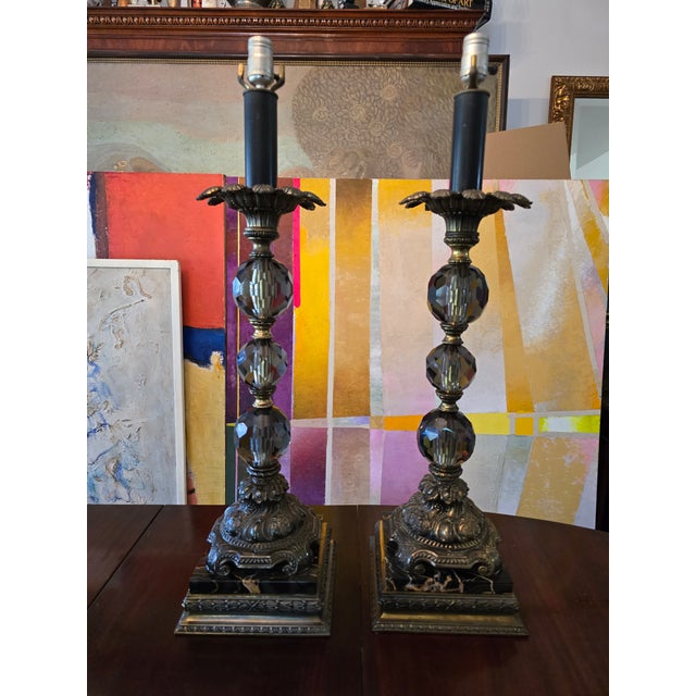 A fantastic pair of original 1950s mid century modern designer faceted smoked crystal ball lamps. Having multiple smoked...