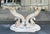 This is a neo-classical style carved wood cornucopia form console table. The finish is intentionally stripped and cerused...