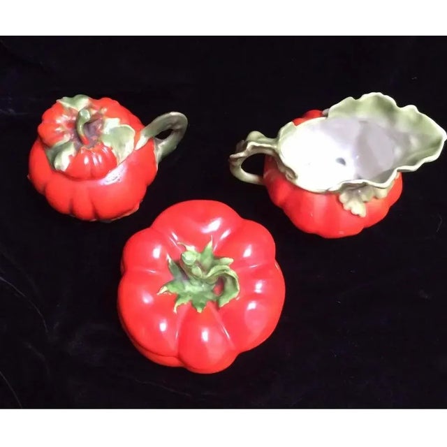 This is a great three-piece antique condiment set of Royal Bayreuth tomato pieces to brighten your table!