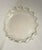 Lucite clear large shallow bowl with ruffle rim. Measures 17 inch in diameter and 2 1/2 inches high.