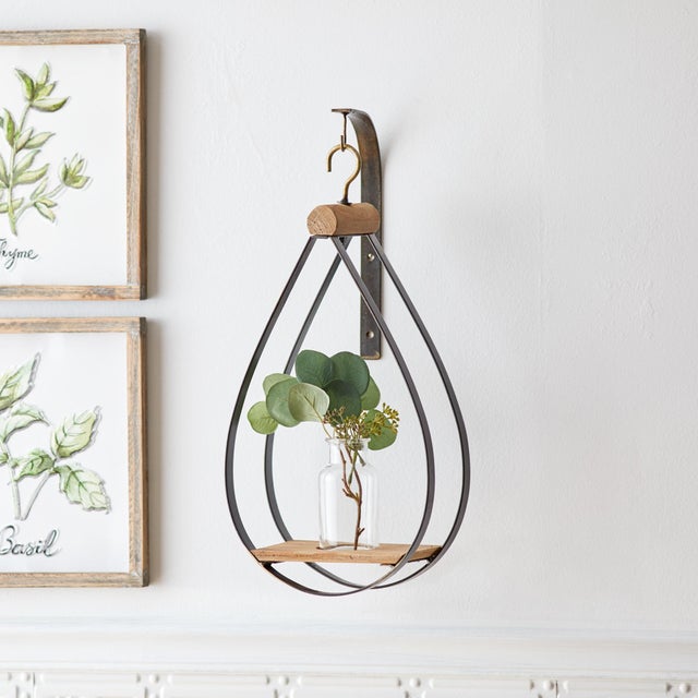 Bring rustic charm and natural elegance to your walls with this Hanging Bottle Vase Set in a teardrop-shaped frame. Each...