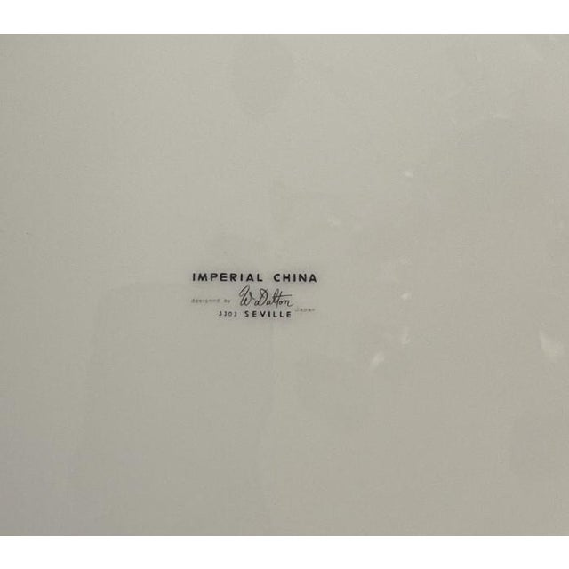 Vintage Imperial China Seville Round Platter by W. Dalton features blue roses and grey scrolls. Made of porcelain by...