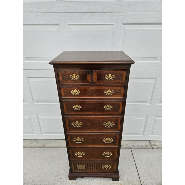 A classic banded mahogany Chippendale style seven drawer lingerie chest. This piece is from Drexel’s 18TH Century Classics...