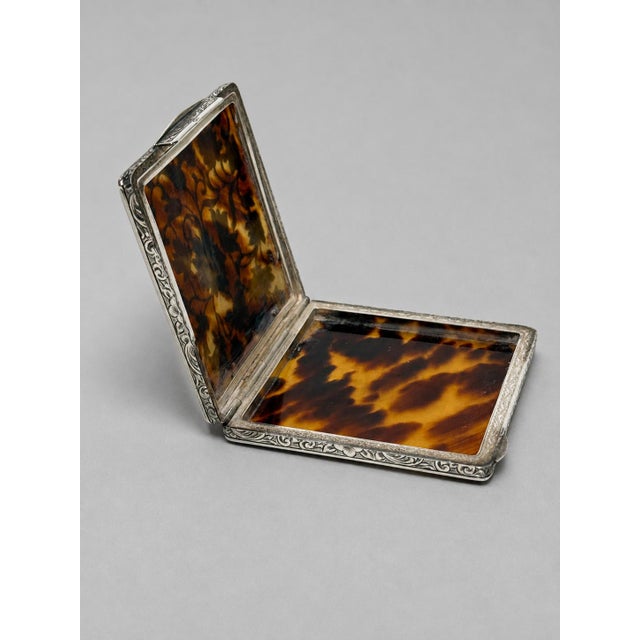 Swedish Sterling Silver And Tortoiseshell Floral Compact A finely made Swedish sterling silver and tortoiseshell compact...