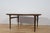 This extending dining table was designed in the 1960s by Johannes Andersen for the renowned Danish manufacturer Uldum...