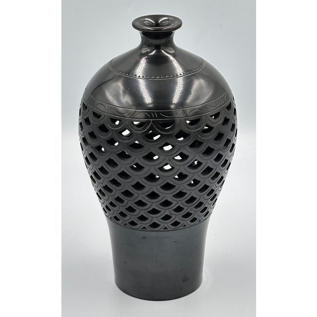 - Luster: The high-gloss black finish is not achieved through glazing. Instead, the surface is hand-rubbed with sea shells...