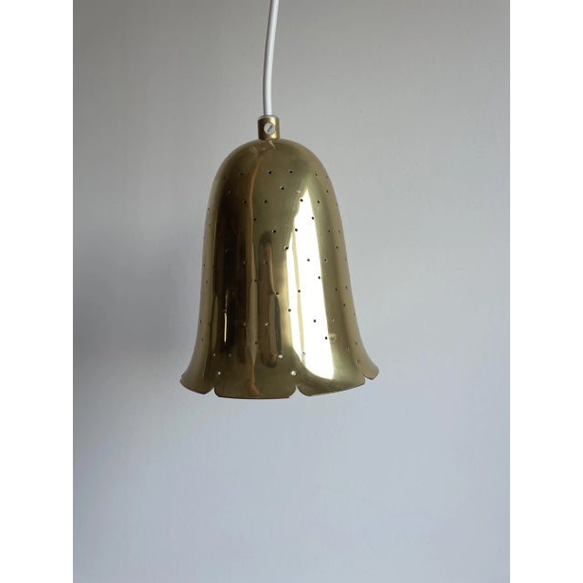 Bell shaped brass pendant with perforated shade. Sweden, 1960s. I have official proof of authenticity such as vintage...