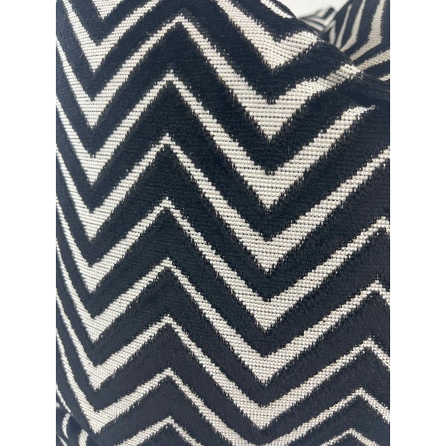 Custom pair of 22" pillows covered in a chevron cut velvet in black and white. These pillows have tapered corners to...