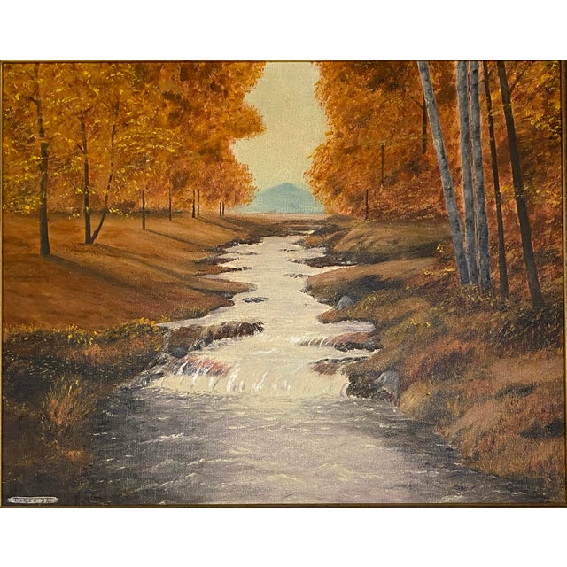 Bring the beauty of fall indoors with this charming Mid-Century oil painting by A. Klosner. A gentle river winds through a...