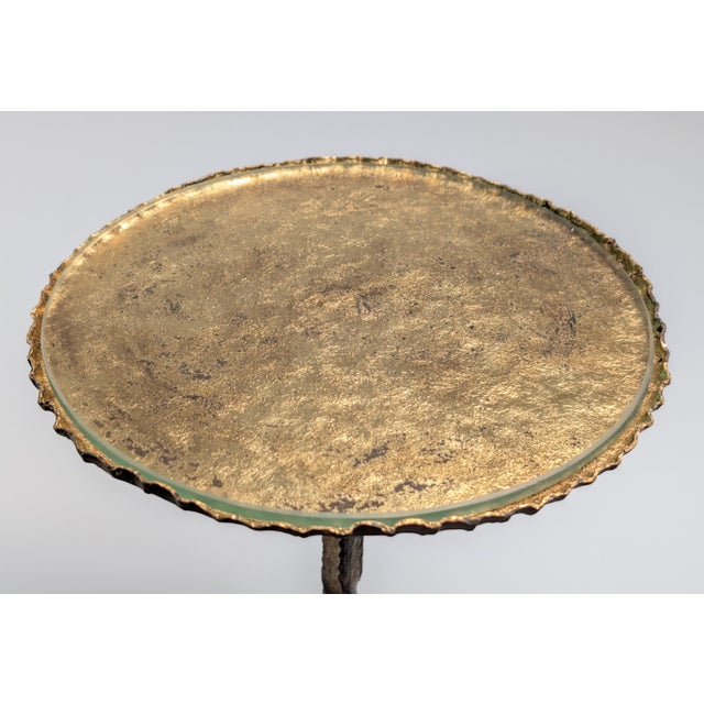 This drinks table was made in Spain during the 1950s and is representative of Mid-Century wrought ironwork. The circular...