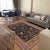 "Enhance the ambiance of your home with this magnificent Persian-influenced Turkish hand-knotted rug made by skilled...