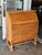 Design Plus Gallery presents an Antique Tiger Oak Secretary Desk. Secretary desks in this Jacobean style are distinguished...