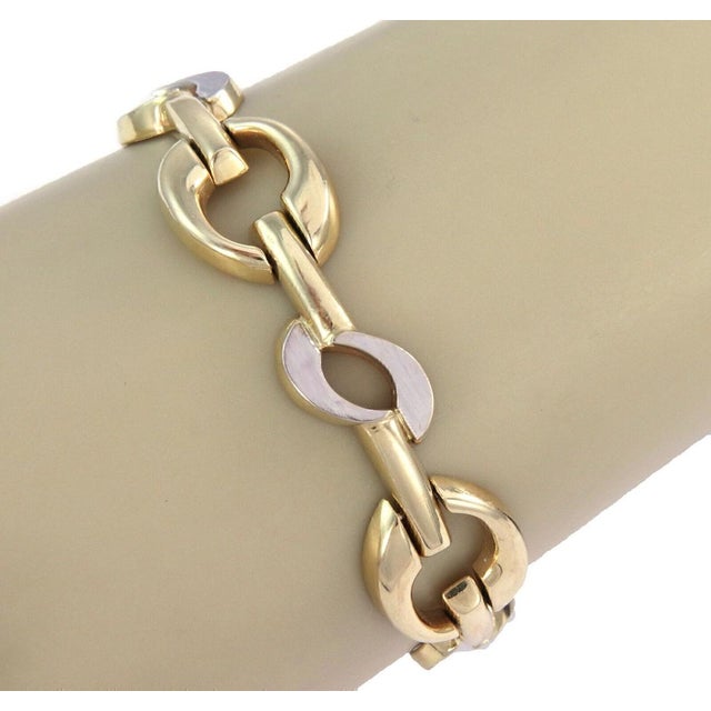 The Wide Fancy 14k Two Tone Gold Link Bracelet is a stunning piece of fine jewelry. Crafted from two-tone gold, this link...