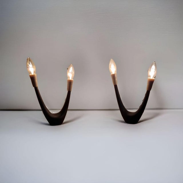 Almost pieces of art! These lamps are made of iron, are midnight blue in colour and have that fabulous organic U-shape...