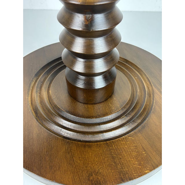 Stunning French side table from the 1940s- 1950s constructed in dark oak. The bases are generally made of decommissioned...