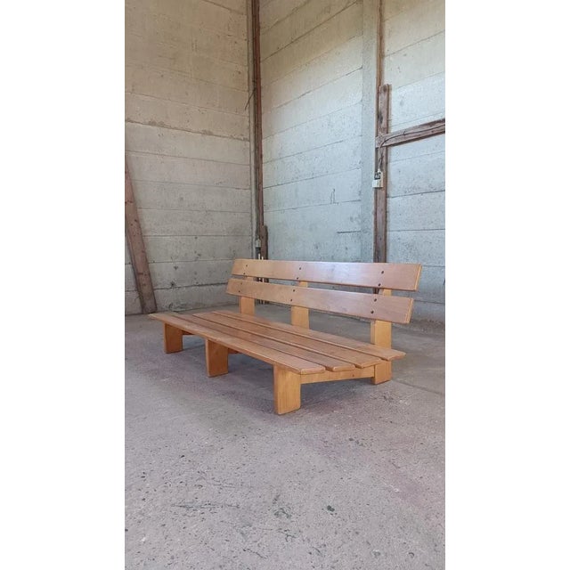 A rare and stylish slatted bench / sofa low three-seater. The wooden frame is made of steamed beech. The flat slats are...