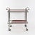 This French Art Deco bar cart from the 1930s impresses with its elegant silhouette and high-quality materials. The chrome-...