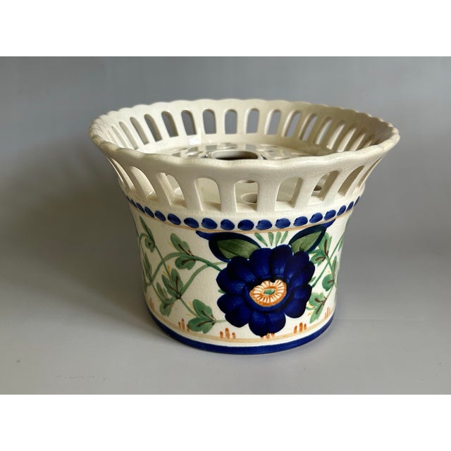 Offering this beautiful antique faience jardiniere with a flower frog insert. It was made in the early 20th century by the...