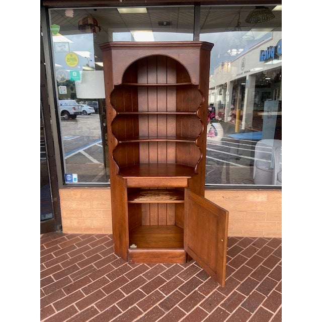 The Cushman Colonial Creation Kitchen Corner Cabinet is a timeless piece that adds both functionality and charm to any...