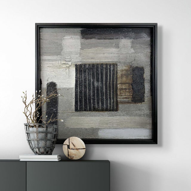 Captive presents a restrained yet powerful composition, where layered neutrals are intersected by subtle linear textures...