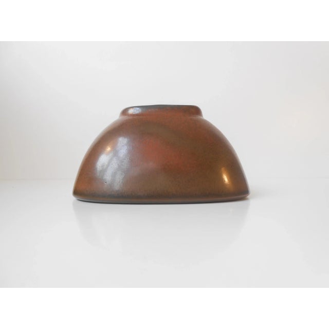 This organically shaped stoneware bowl was designed by Valdemar Petersen and manufactured by B&G (Bing & Grøndahl) in...