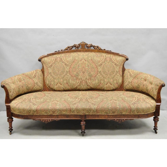 Antique Eastlake Victorian Carved Burl Walnut Shield Back Parlor Set with Sofa & 2 Side Chairs - 3 Pc Set. Set includes...