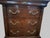 Owned by one family, a bedside chest in the neoclassical style by Henredon, of Morganton, North Carolina, USA. Burl elm...