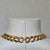 Vintage Napier Signed 1980s Gold Tone Graduated Curb Link Statement Necklace This striking collar-length necklace features...