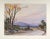 Vintage impressionist watercolor painting of a landscape at sunset. Signed indistinctly and dated 1958 lower left....